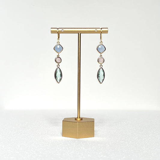 This earring set features pale blue, pink, and green glass charms in a gold bezel hung on a French lever back hook.
