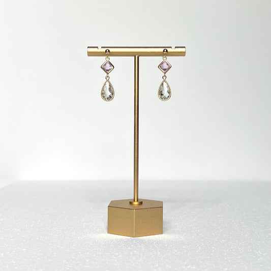 This earring set features a petite pink glass bezel set charm with a clear crystal teardrop shape fancy prong bezel setting hung on a 3mm gold filled earring stud post. 