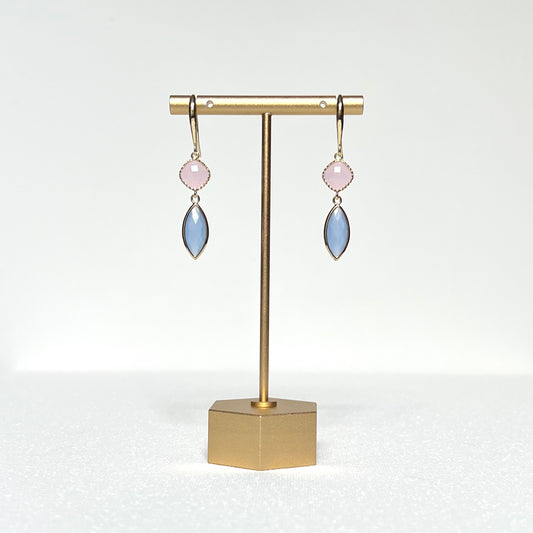 This earring set features a pale pink glass fancy bezel prong set charm and a pale blue glass marquis shaped bezel charm hung by a simple gold filled French hook. 